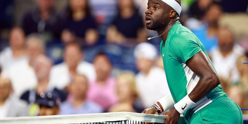 frances tiafoe milos raonic tennis match turns into wild rules debacle that leads to raucous boos