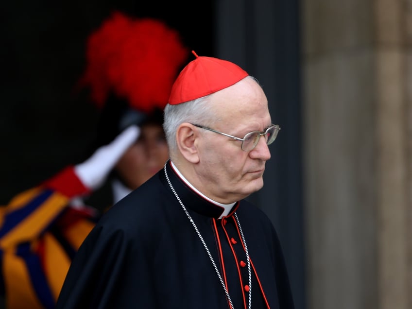 VATICAN CITY, VATICAN - OCTOBER 07: Hungarian archbisop of Budapest cardinal Peter Erdo leaves the Synod Hall at the end of a session of the Synod on the themes of family on October 7, 2014 in Vatican City, Vatican. In his 'Report prior to discussion' presented Tuesday morning to Synod Fathers and Fraternal delegates, the relator general Cardinal Peter Erdo, pointed to the 'privatization of love' as the greatest challenge to the family. (Photo by Franco Origlia/Getty Images)