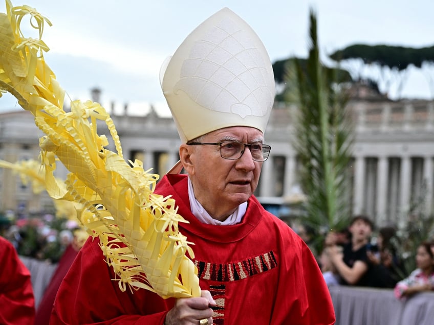 The Vatican's Cardinal Secretary of State Pietro Parolin attends a mass for Palm Sunday in St Peter's square in the Vatican on April 13, 2025. (Photo by Tiziana FABI / AFP) (Photo by TIZIANA FABI/AFP via Getty Images)