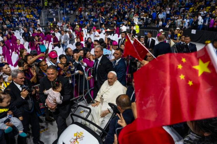 francis opens clinic on 1st papal visit to mongolia he says its about charity not conversion