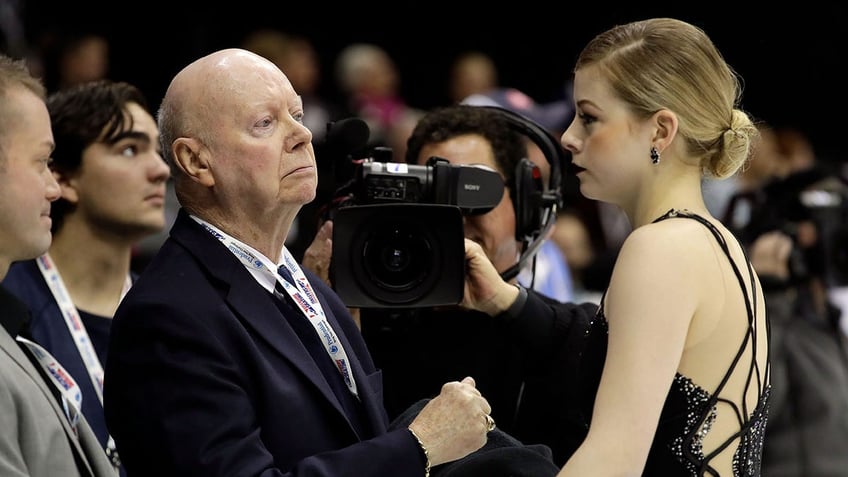 Gracie Gold speaks to coach Frank Carroll