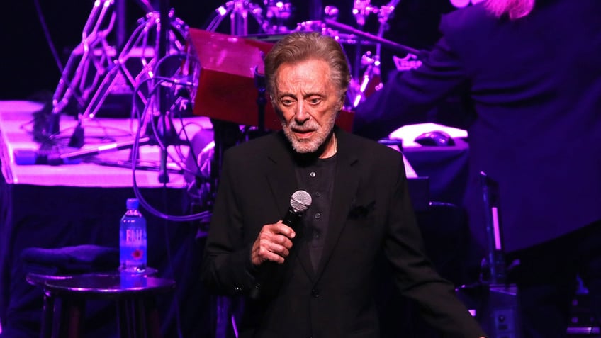 Frankie Valli sings on stage