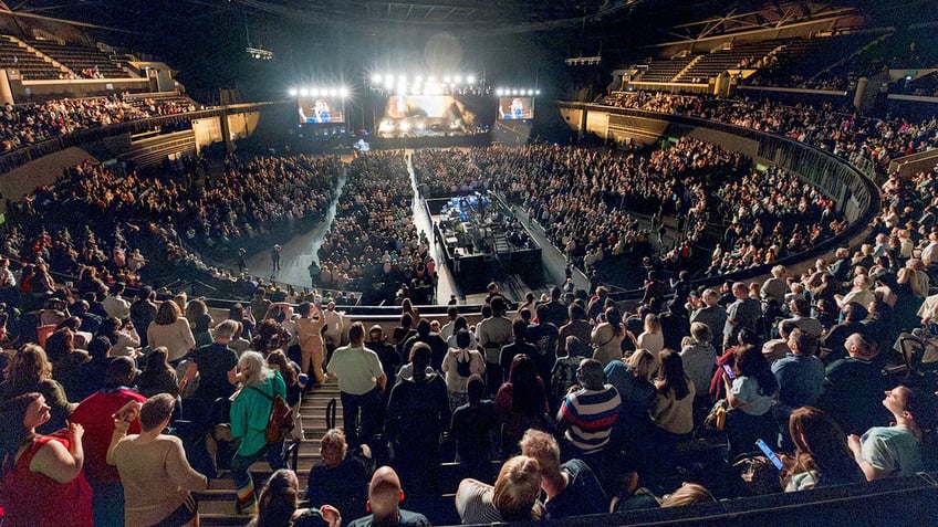 venue crowd at God Loves You Tour