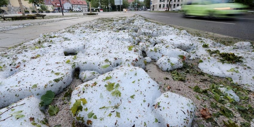 freak august hailstorm causes chaos as snowplows take to streets in summer