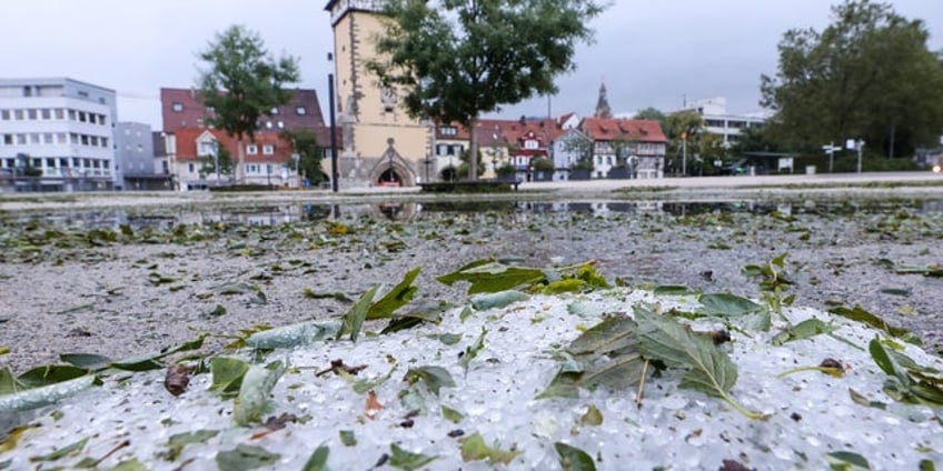 freak august hailstorm causes chaos as snowplows take to streets in summer