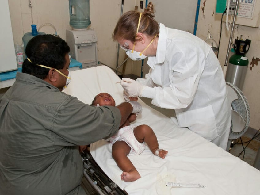 baby-lying-down-on-hospital-bed-getting-a-check-up