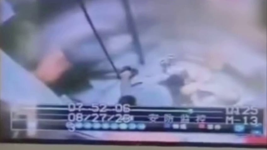 freefall elevator suddenly takes plunge in china apartment building injuring three people