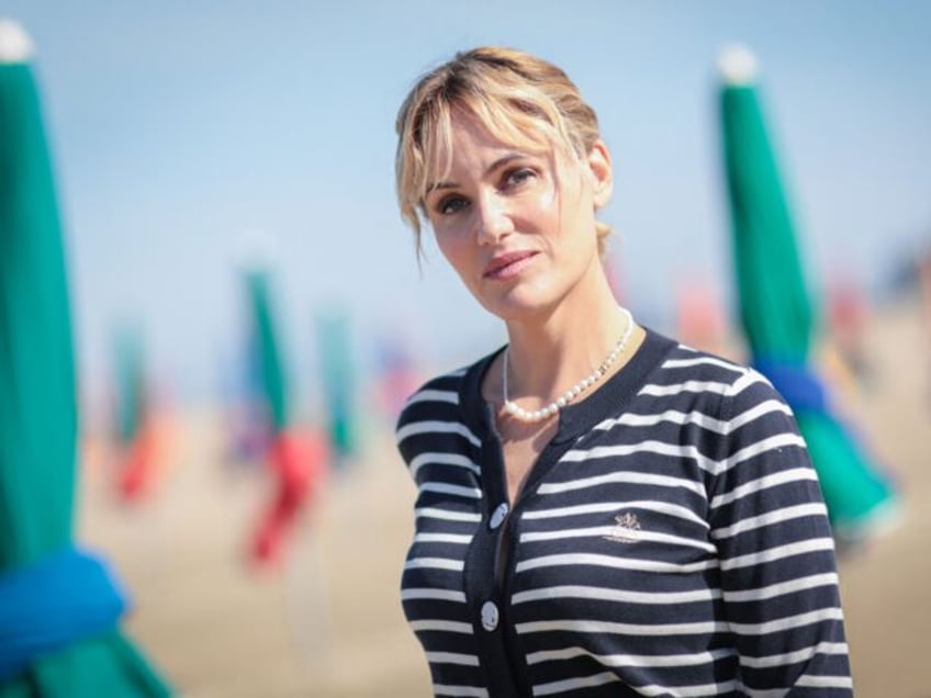 French actress Judith Godreche poses on the beach as part of the 49th edition of the American Film Festival in Deauville, northwestern France on September 3, 2023. (Photo by LOU BENOIST / AFP) (Photo by LOU BENOIST/AFP via Getty Images)