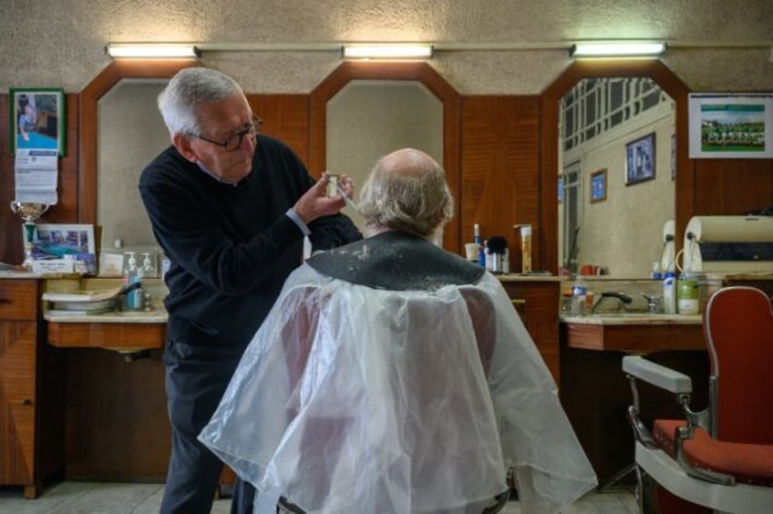 Roger Amilhastre could be France's oldest barber