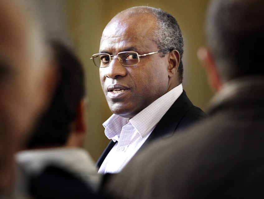 Rwandan doctor Sosthene Munyemana arrives on October 7, 2010 at the courthouse of Bordeaux, southwestern, where an appeal court is to decide on Kigali's request to extradite Munyemana, suspected of taking part in the 1994 genocide in Rwanda. AFP PHOTO / PHOTO PATRICK BERNARD (Photo credit should read PATRICK BERNARD/AFP …