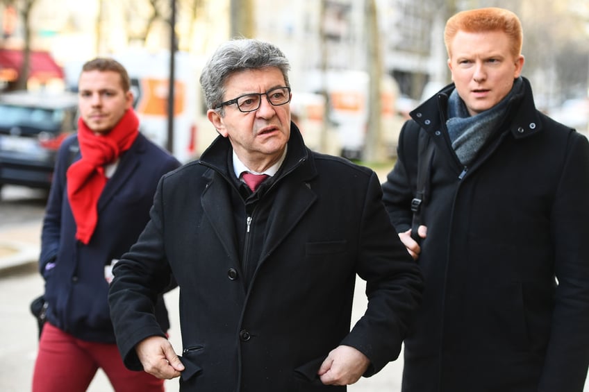 French leftist party La France Insoumise (LFI) deputies Jean-Luc Melenchon (C) and Adrien Quatennens (R) arrive prior to a meeting with party leaders, presidents of assemblies and parliamentary groups about the COVID-19 spread, in Paris on March 12, 2020. - The World Health Organization sounded a global alarm bell on March 11, 2020, officially classifying as a pandemic the virus that has infected more than 126,000 people and killed 4,600, according to Johns Hopkins University. (Photo by CHRISTOPHE ARCHAMBAULT / AFP) (Photo by CHRISTOPHE ARCHAMBAULT/AFP via Getty Images)