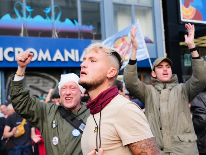 Raphaël Arnault, member of Jeune Garde Antifasciste leads the procession of youth organiz