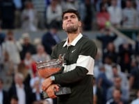 French Open: Alcaraz rallies to defeat Sinner in record-long finale