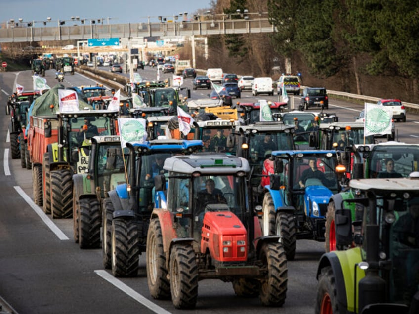 Farmers are participating in a protest by blocking the A35 highway in Strasbourg, Eastern France, on January 24, 2024. (Photo by STR/NurPhoto via Getty Images)