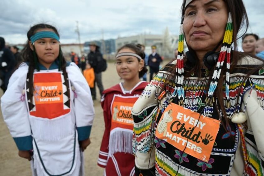 Indigenous women await the arrival of Pope Francis in Iqaluit, Nunavut, Canada, in July 20