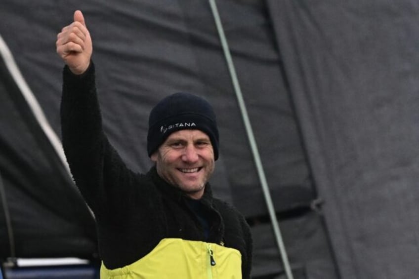 French skipper Charles Caudrelier celebrates after winning the Ultim Challenge, the first