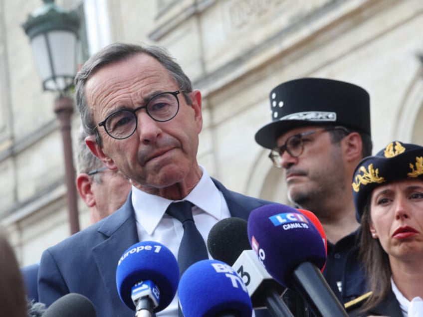 France's Minister of the Interior Bruno Retailleau speaks to the press during a visit afte