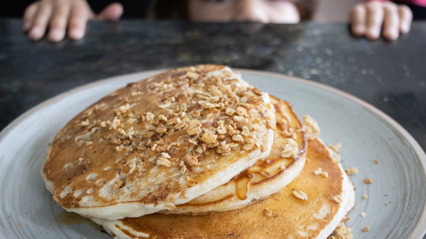 Andrew Gruel's granola pancakes recipe came about because one of his sons wanted granola and the other wanted pancakes for breakfast.