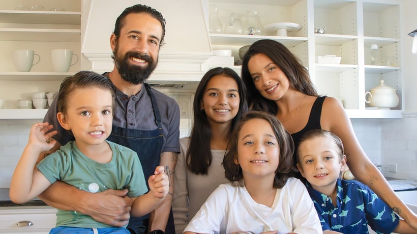 This family portrait of Andrew Gruel and his family was used on the cover of his cookbook.