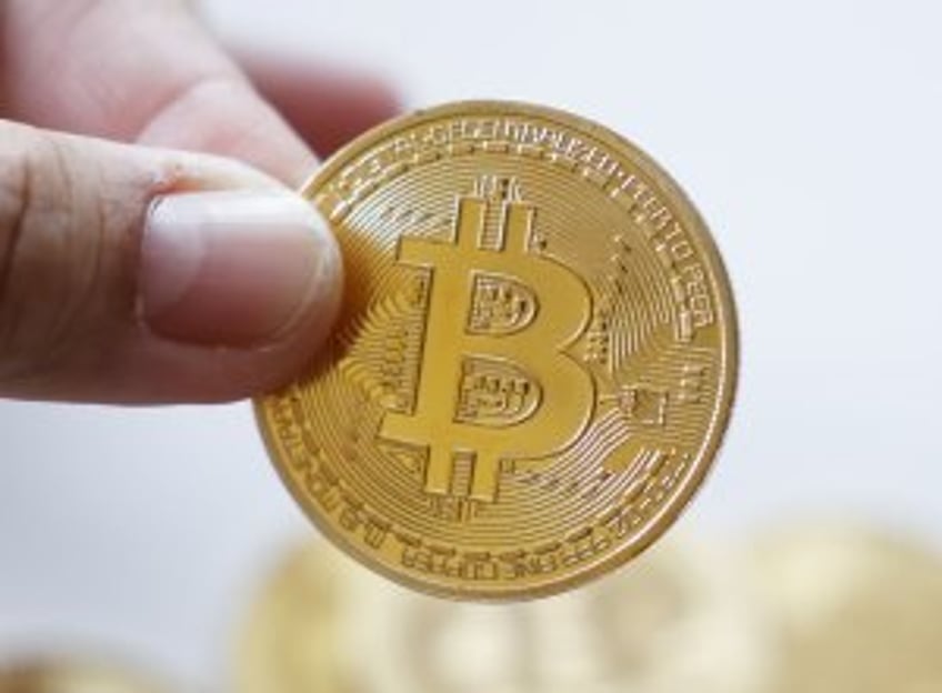 Frenzied pace for bitcoin ETF trading tops $1B during first hour Thursday