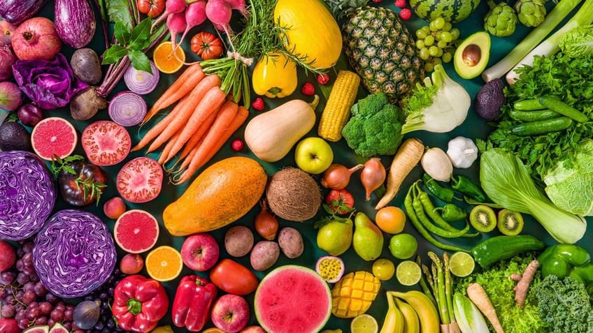 An array of colorful raw fruits and vegetables.