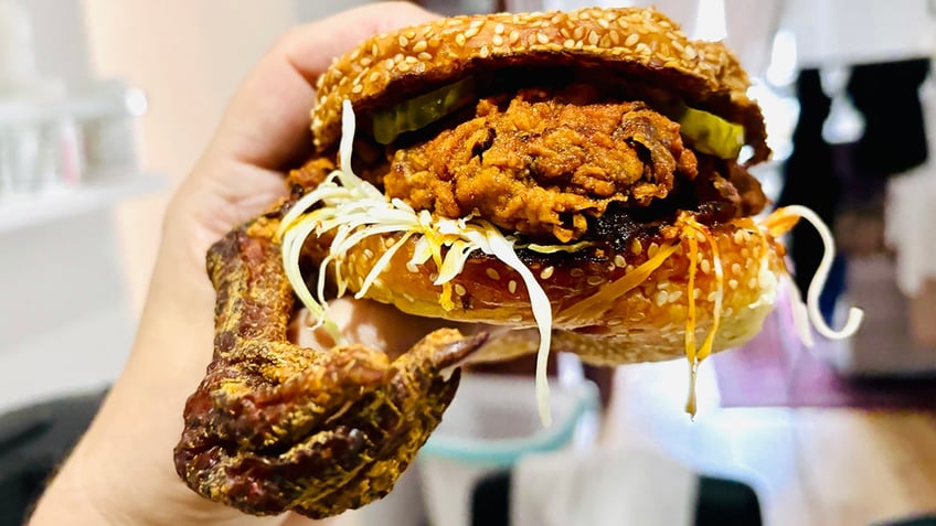 The signature Birdbox chicken sandwich is brined in a salt bath, marinated in buttermilk curry for five days, then double fried, splashed in spiced duck fat and served with two types of house-made mayonnaise.