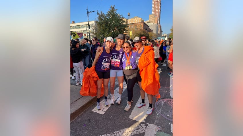 friends run for a cure for lupus completing nyc marathon in honor of longtime pal and lupus sufferer