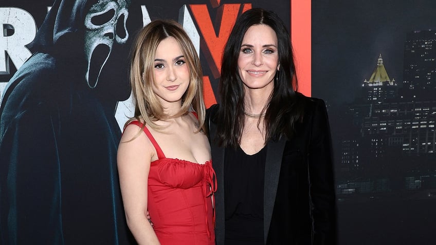 Coco Arquette and Courteney Cox posing together