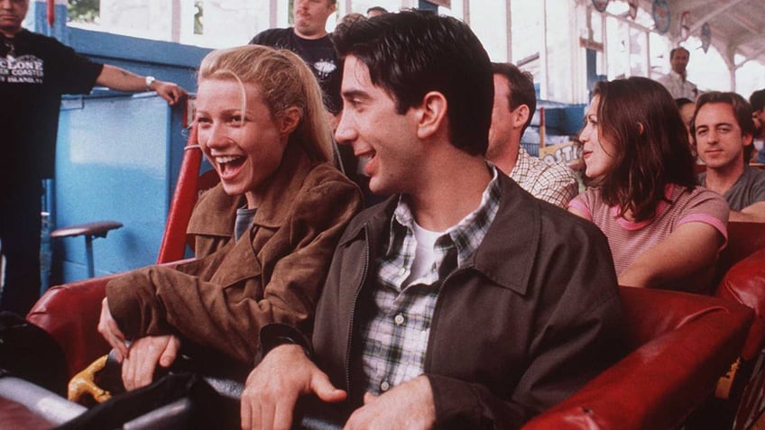 Gwyneth Paltrow and David Schwimmer ride a rollercoaster in the film "The Pallbearer"