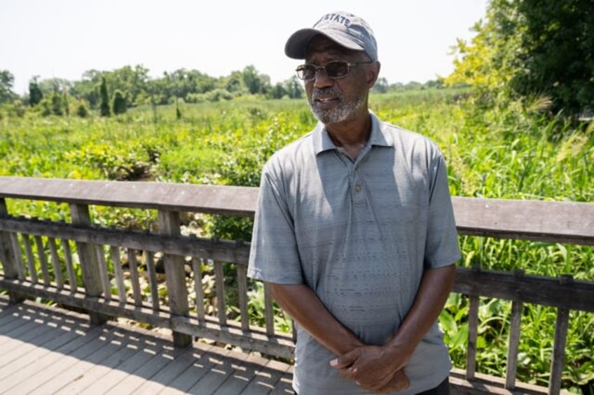 Dennis Chestnut, an advocate for making the Anacostia River swimmable, speaks with AFP fro