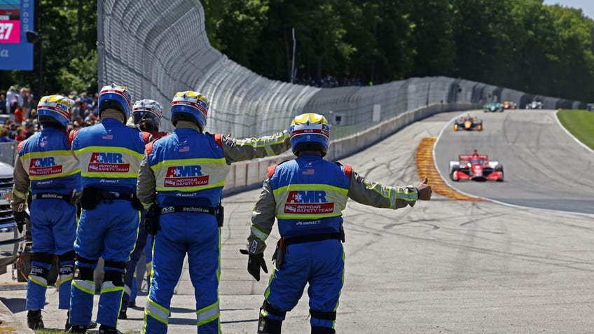 Emergency crews give a thumbs up to Marcus Ericsson going into Turn 5 before the start of the 2022 Grand Prix at Road America 