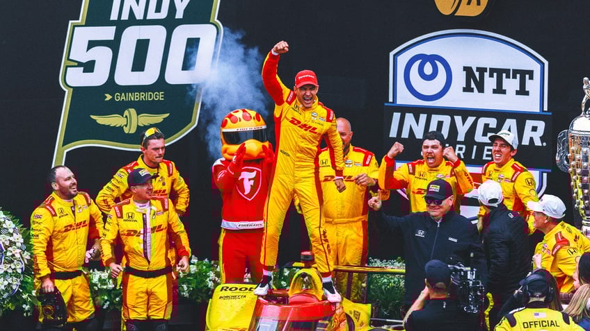 Alex Palou celebrates after winning 2025 Indy 500