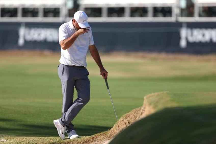 Scottie Scheffler reacts on the 15th green in Friday's second round at the US Open, where