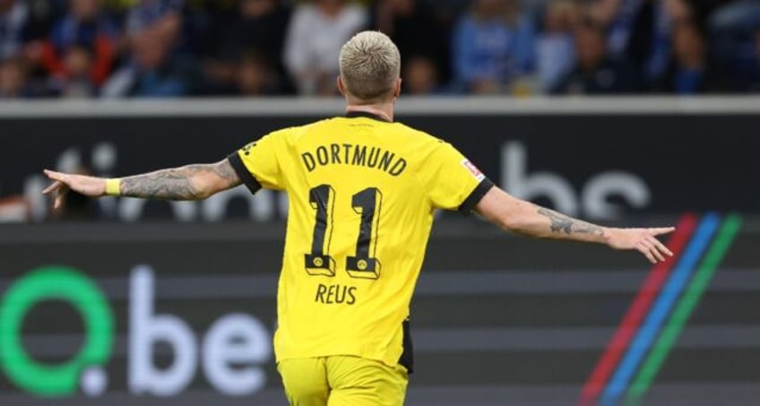 fuellkrug reus special help 10 man dortmund beat hoffenheim to go top