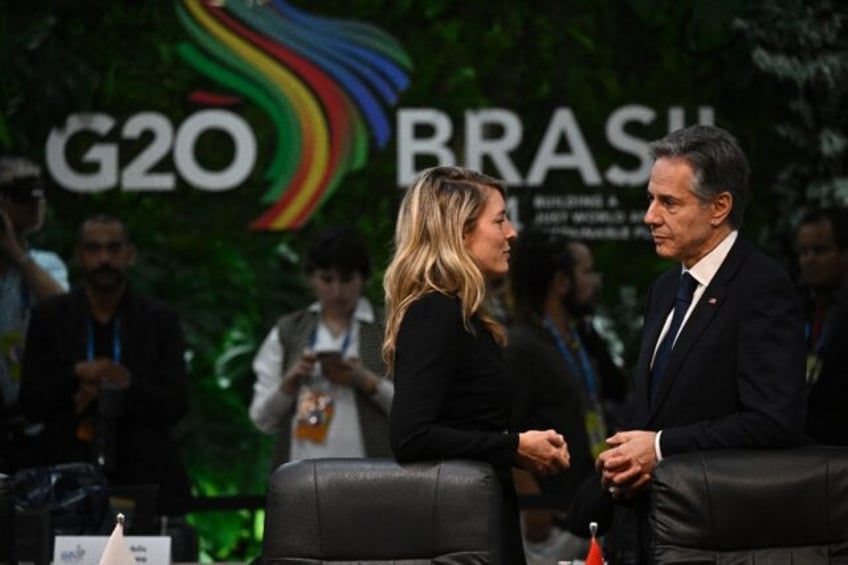 Canada's Minister of Foreign Affairs Melanie Joly (L) and US Secretary of State Anthony Bl