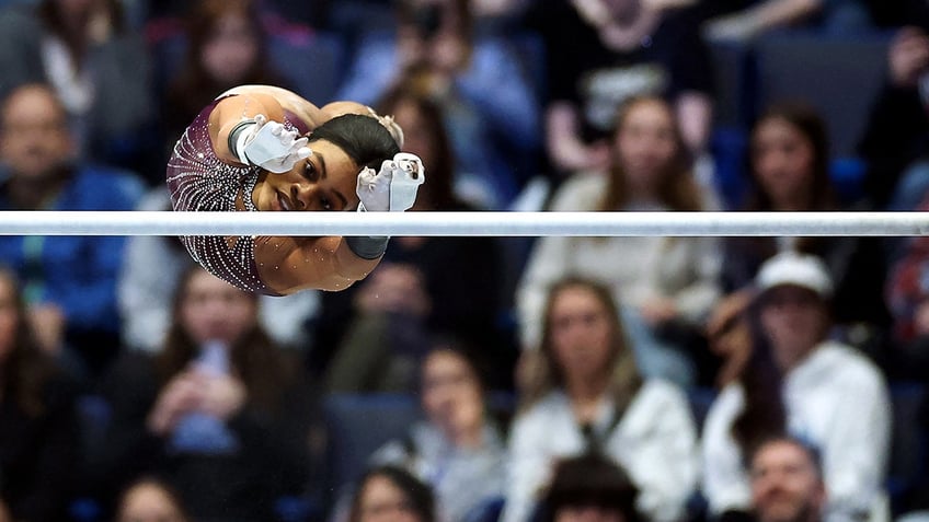 Gabby Douglas on the bars