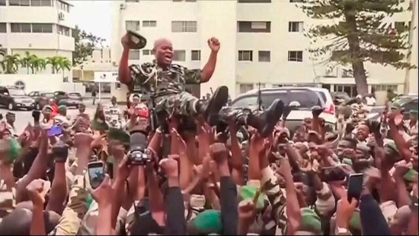 gabons military leader is sworn in as head of state after ousting the president last week