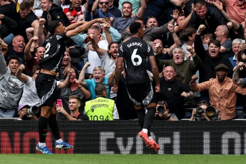 Arsenal defender Gabriel Magalhaes celebrates scoring against Tottenham