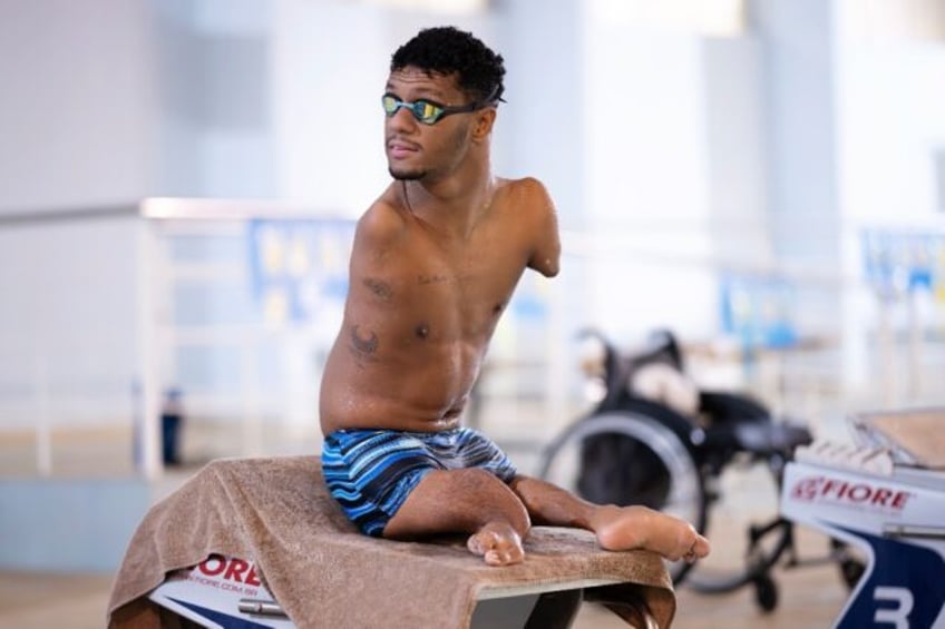 Gabriel dos Santos Araujo prepares to dive during a training session