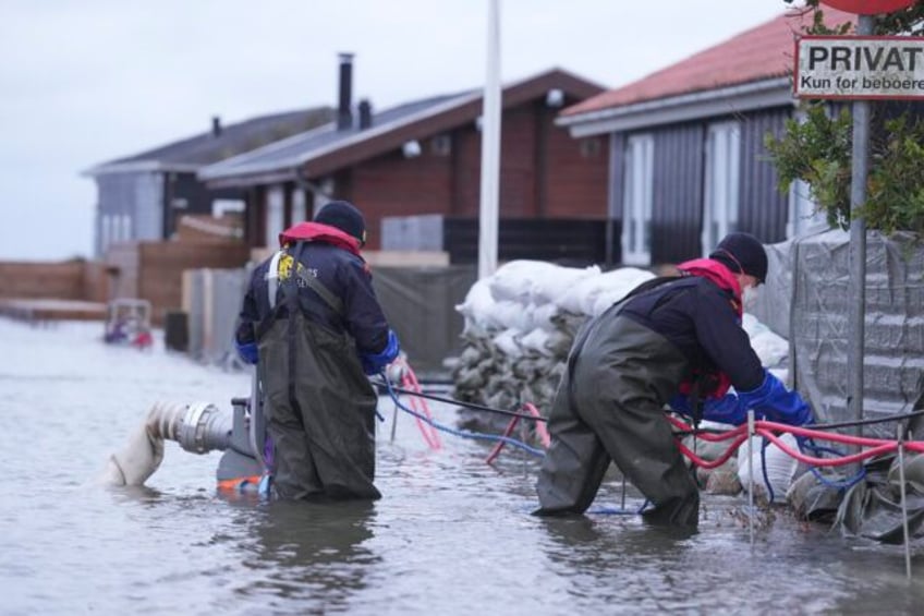 gale force winds and floods strike northern europe at least 3 people killed in the uk