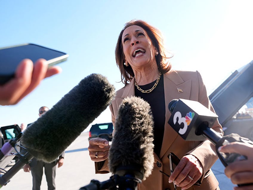 Democratic presidential nominee Vice President Kamala Harris speaks to reporters before sh