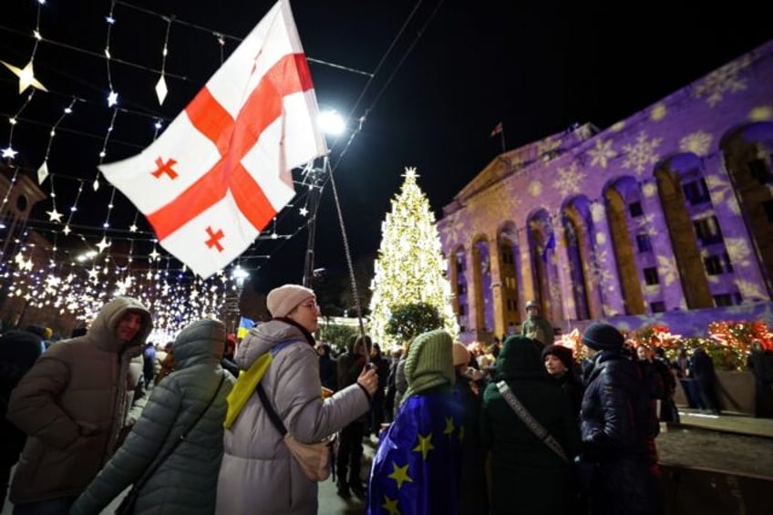 Protesters staged marches at a dozen locations across the capital Tbilisi before several t