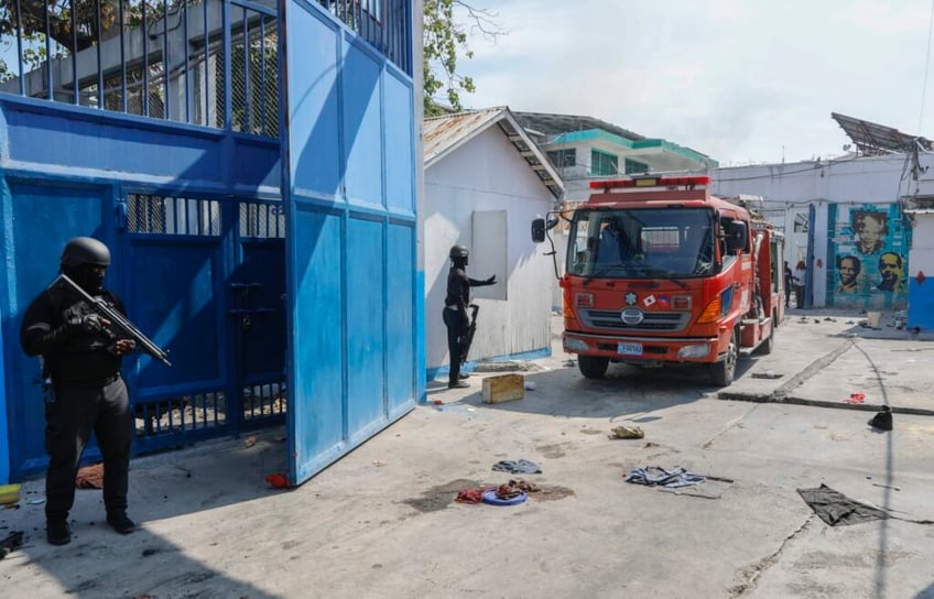 gangs burn down home of haitian national police chief