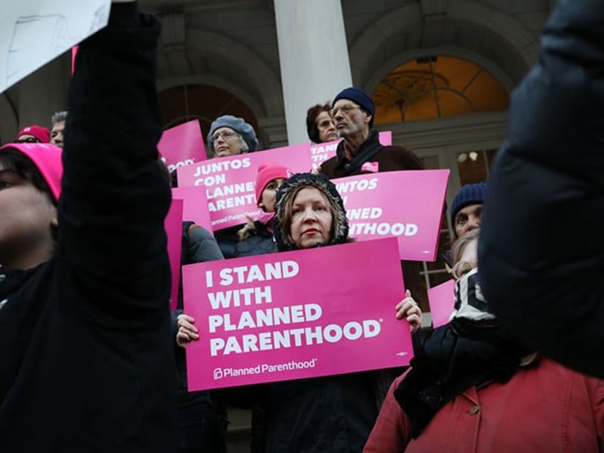 NEW YORK, NEW YORK - FEBRUARY 25: Pro-choice activists, politicians and others associated with Planned Parenthood gather for a news conference and demonstration at City Hall against the Trump administrations title X rule change on February 25, 2019 in New York City. The proposed final rule for the Title X Family Planning Program, called the “Gag Rule,” would force a medical provider receiving federal assistance to refuse to promote, refer for, perform or support abortion as a method of family planning. (Photo by Spencer Platt/Getty Images)