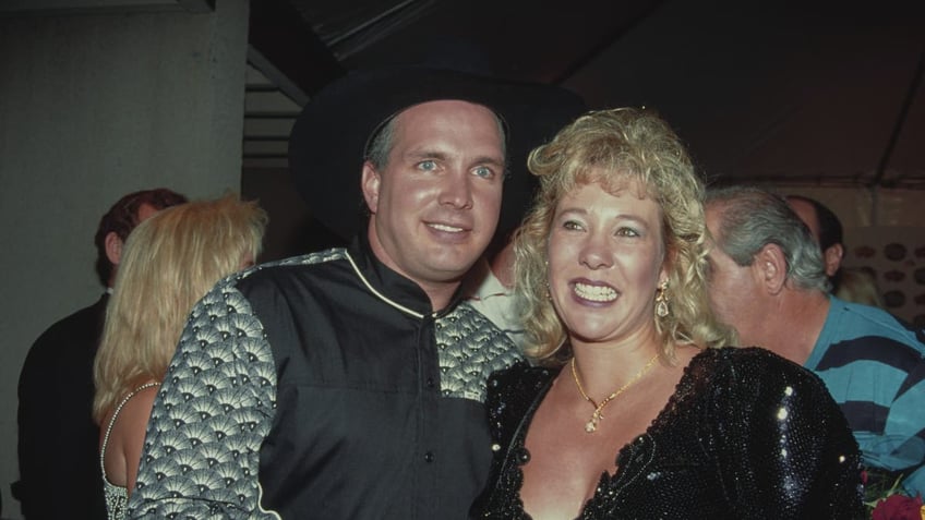 Garth Brooks and wife Sandy Mahl smiling