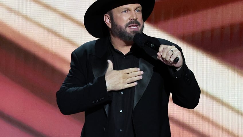 Garth Brooks speaks onstage ACMs