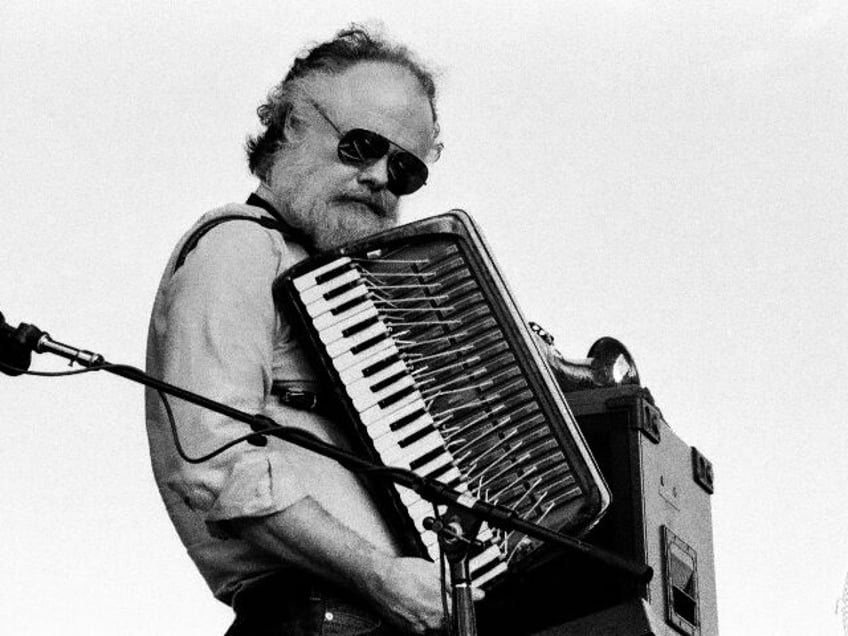 Canadian Rock musician Garth Hudson, of the group the Band, plays accordion as he performs