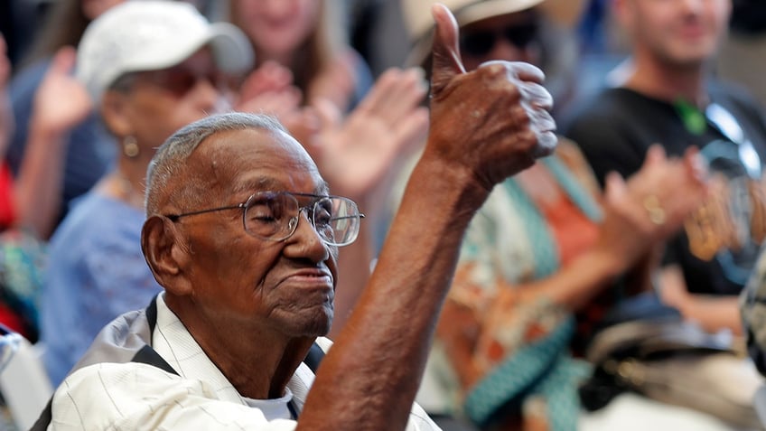 In this Sept. 12, 2019, file photo, World War II veteran Lawrence Brooks celebrates his 110th birthday at the National World War II Museum in New Orleans.