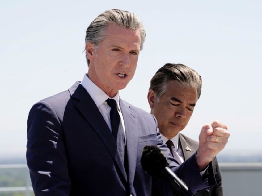 Standing atop the Cal. EPA building, Calif. Gov. Gavin Newsom discusses the U.S. Senates v