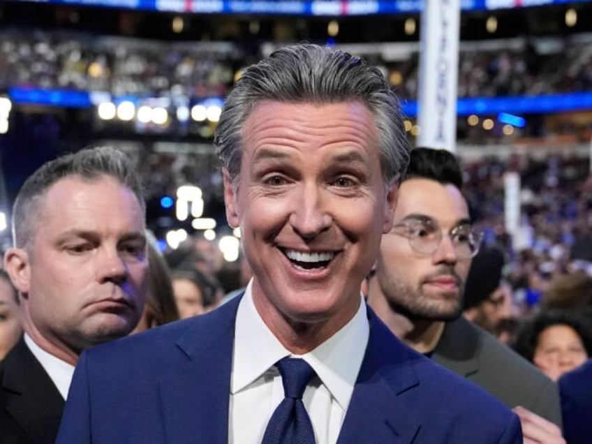 California Gov. Gavin Newsom casts their votes for Democratic presidential nominee Vice Pr